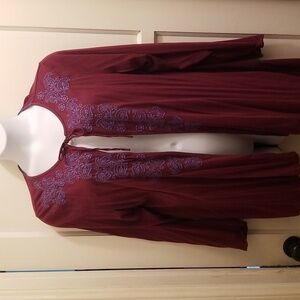 Long sleeve embroidered cardigan.